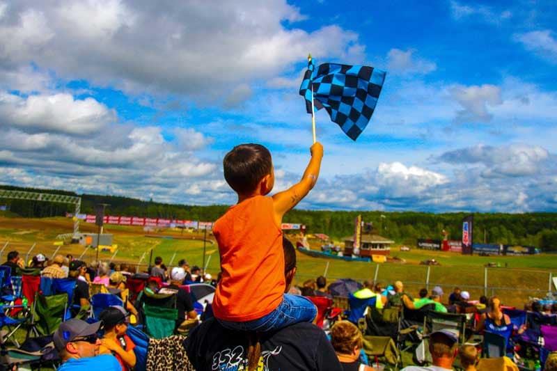 Crandon International Raceway kid waving a flag